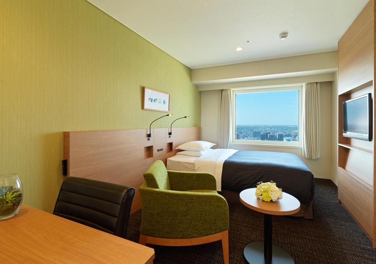 Hotel Emisia Sapporo Exterior foto A room at the hotel